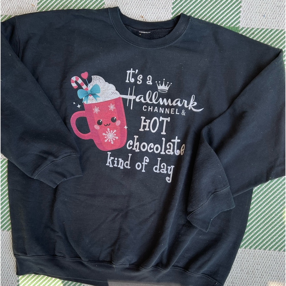 Hallmark graphic sweatshirt. Tags have been removed. 3X? 2X? Lowest price today